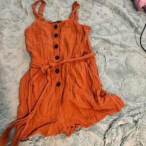 Cute rust colored romper, size Medium